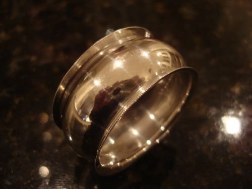 birmingham 1903 solid silver napkin ring of bellied form made by william vale and sons