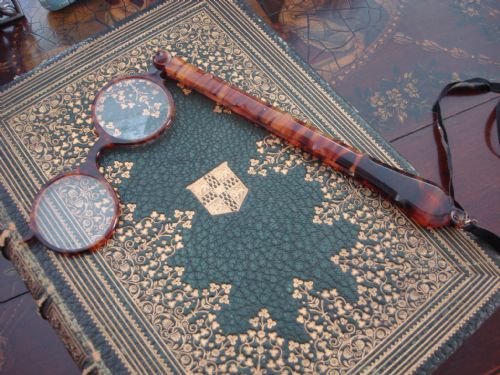 early 20th century set of tortoise shell style lorgnettes leather case neck lanyard and original box