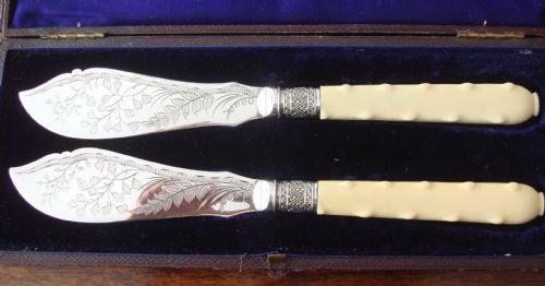 19th century victorian lustrous silver plate and ivory pair of large butter knives in the original fitted case